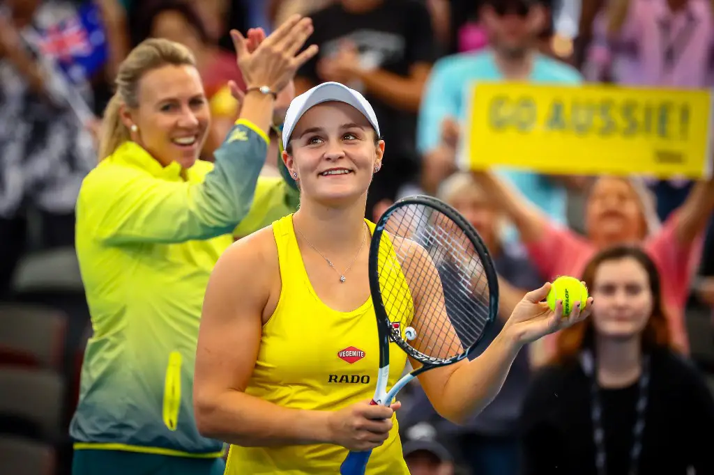 Ashleigh Barty of Australia celebrates her victory over Aryna Sabalenka of Belarus following her second round match of the Fed Cup tennis semi-final between Australia and Belarus at the Pat Rafter Arena in Brisbane on April 21, 2019. (Photo by Patrick HAMILTON / AFP) / -- IMAGE RESTRICTED TO EDITORIAL USE - STRICTLY NO COMMERCIAL USE --