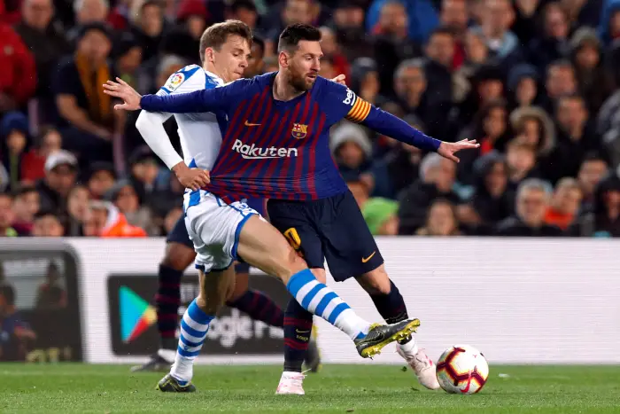 Soccer Football - La Liga Santander - FC Barcelona v Real Sociedad - Camp Nou, Barcelona, Spain - April 20, 2019   Barcelona's Lionel Messi in action with Real Sociedad's Diego Llorente