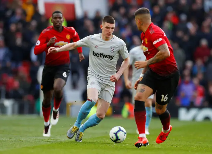 West Ham's Declan Rice in action with Manchester United's Marcos Rojo