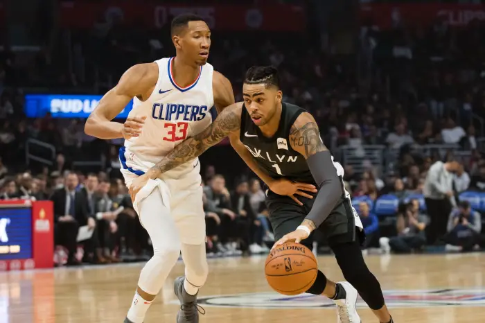 Brooklyn Nets Guard D'Angelo Russell (1) drives the ball up the middle against Los Angeles Clippers Forward Wesley Johnson (33)