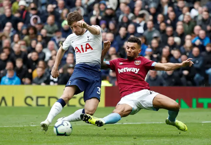 West Ham's Ryan Fredericks blocks a shot from Tottenham's Ben Davies