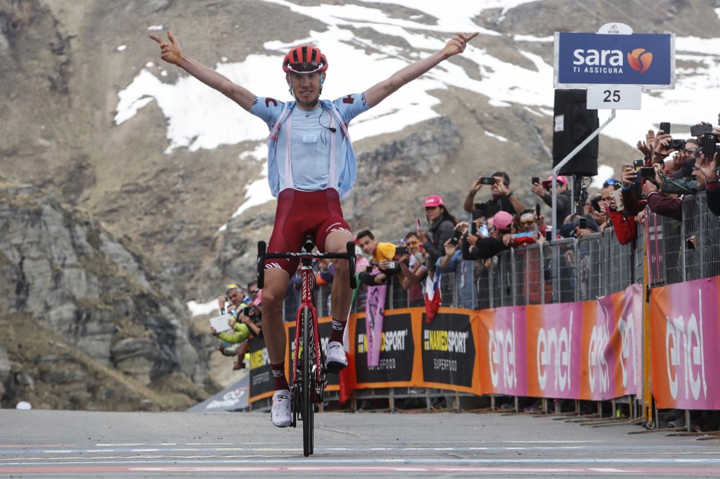 Team Katusha rider Russia's Ilnur Zakarin reacts as he crosses the finish line to win stage thirteen of the 102nd Giro d'Italia - Tour of Italy - cycle race, 196kms from Pinerolo to Ceresole Reale (Lago Serru) on May 24, 2019. (Photo by Luk BENIES / AFP)
