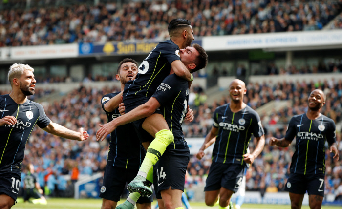 Manchester City's Aymeric Laporte celebrates scoring their second goal with team mates