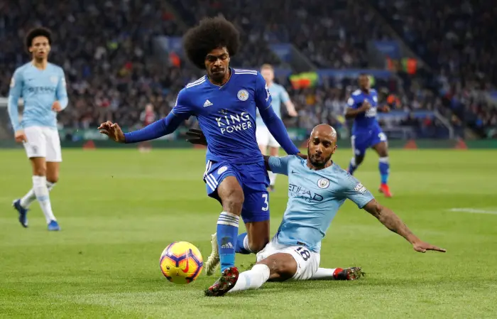 Soccer Football - Premier League - Leicester City v Manchester City - King Power Stadium, Leicester, Britain - December 26, 2018  Manchester City's Fabian Delph in action with Leicester City's Hamza Choudhury