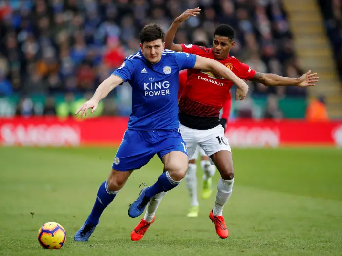 Leicester City's Harry Maguire in action with Manchester United's Marcus Rashford