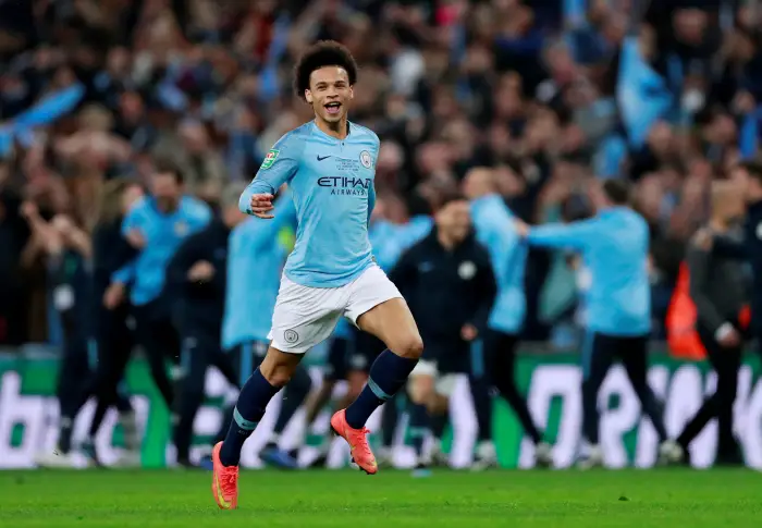 Manchester City's Leroy Sane celebrates after winning the penalty shootout