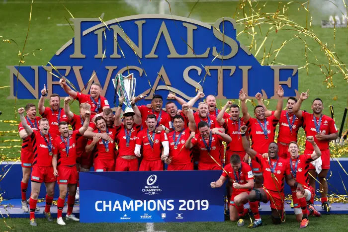 Rugby Union - European Champions Cup Final - Leinster Rugby v Saracens - St James' Park, Newcastle, Britain - May 11, 2019   Saracens players celebrate winning the final with the trophy after the match