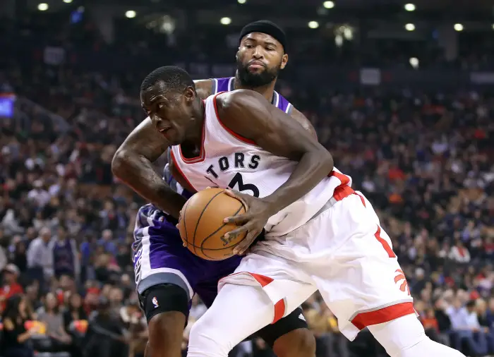 Toronto Raptors forward Pascal Siakam (43) goes to the basket against Sacramento Kings forward DeMarcus Cousins (15) at Air Canada Centre. The Kings beat the Raptors 96-91.