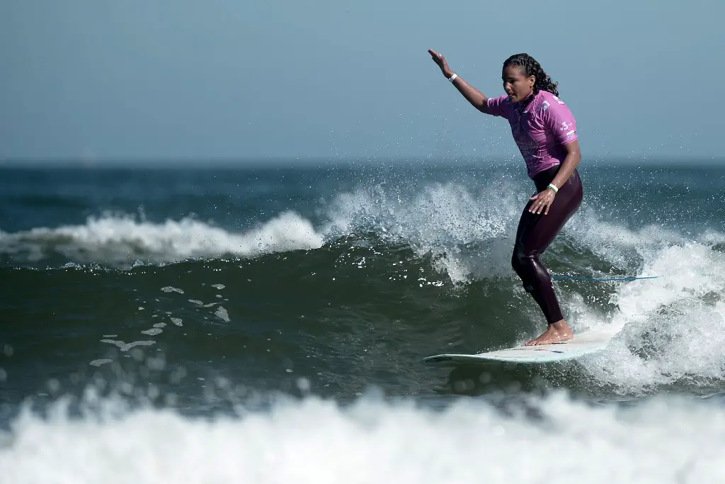 France's Alice Lemoigne rides a wave during  the ISA World Longboard Surfing Championships in Biarritz, southwestern France, on May 30, 2019. (Photo by IROZ GAIZKA / AFP)