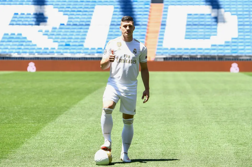Real Madrid's Serbian forward Luka Jovic poses at the Santiago Bernabeu stadium in Madrid on June 12, 2019 during his official presentation. - Real Madrid have signed 21-year-old Serbia striker Luka Jovic from German side Eintracht Frankfurt on a six-year deal for an undisclosed fee. (Photo by PIERRE-PHILIPPE MARCOU / AFP)