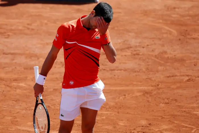 Tennis - French Open - Roland Garros, Paris, France - June 8, 2019. Serbia's Novak Djokovic reacts after his semifinal match against Austria's Dominic Thiem.