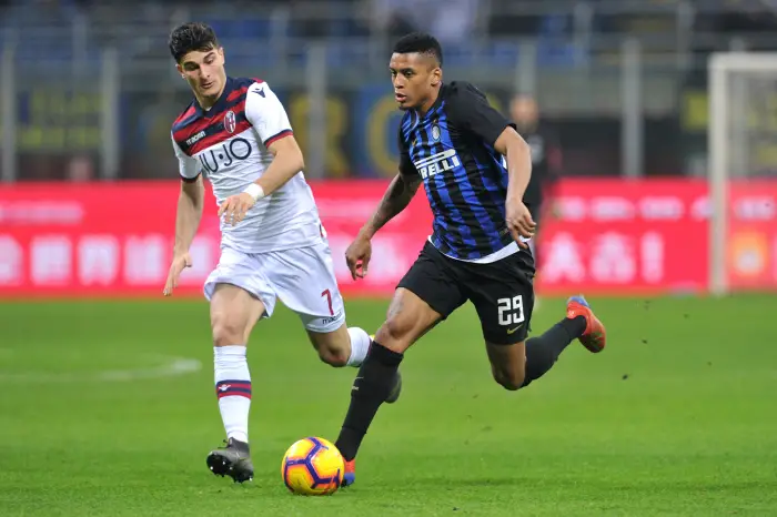 Inter Milan's Dalbert Henrique in action with Bologna's Riccardo Orsolini
