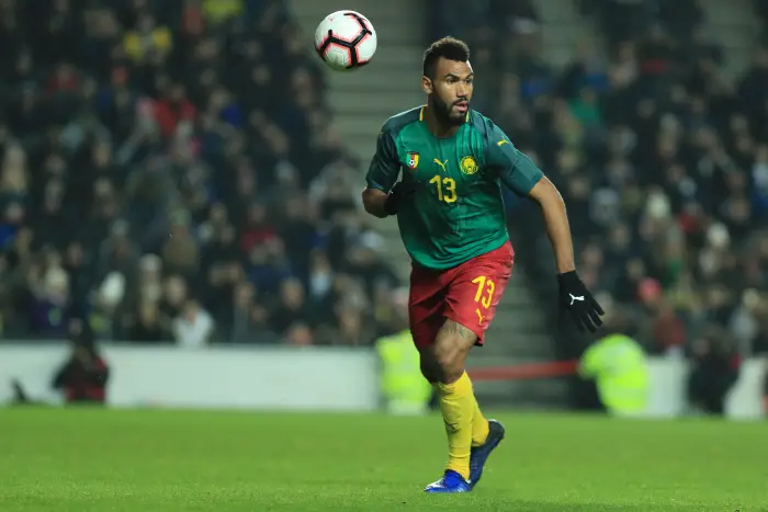 Eric Maxim Choupo-Moting of Cameroon chases the loose ball