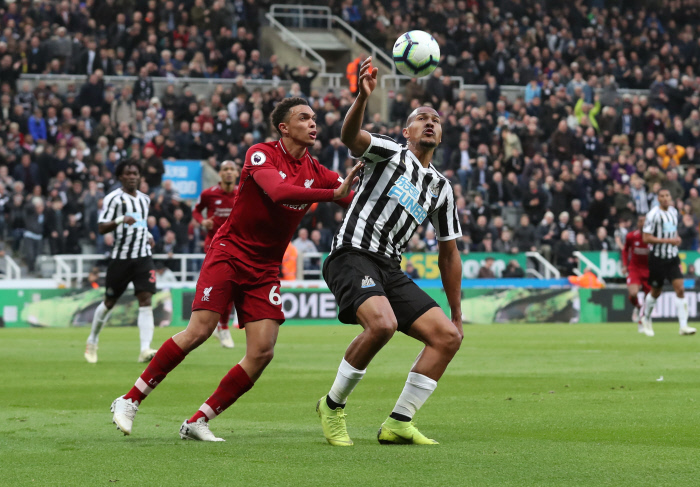 Soccer Football - Premier League - Newcastle United v Liverpool - St James' Park, Newcastle, Britain - May 4, 2019   Liverpool's Trent Alexander-Arnold in action with Newcastle United's Salomon Rondon