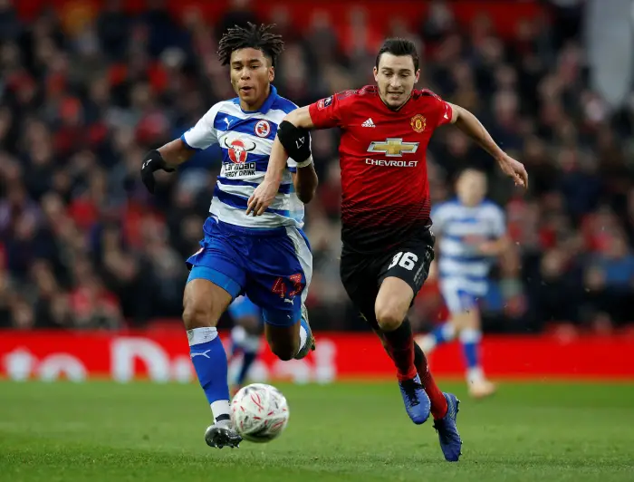 Manchester United's Matteo Darmian in action with Reading's Danny Loader