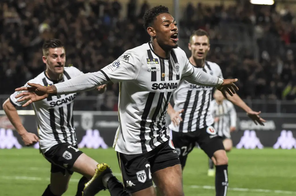 Angers' French midfielder Jeff Reine Adelaide celebrates after scoring a goal during the French L1 football match between Angers (SCO) and Rennes (Stade Rennais FC) at the Raymond-Kopa stadium in Angers, western France, on April 6, 2019. (Photo by Sebastien SALOM-GOMIS / AFP)