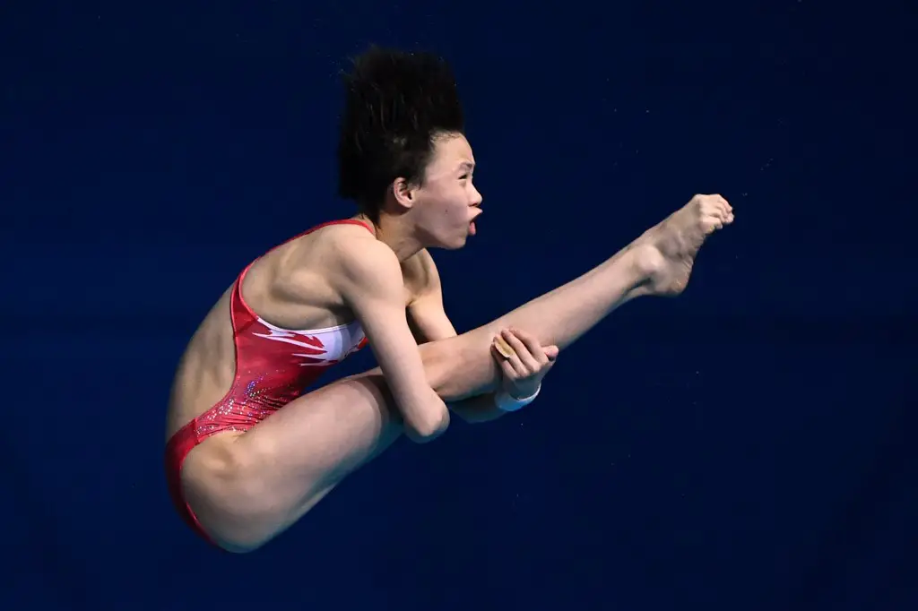 China's Chen Yuxi competes in the women's 10m platform diving final during the 2019 World Championships at Nambu International Aquatics Centre in Gwangju on July 17, 2019. (Photo by Ed JONES / AFP)