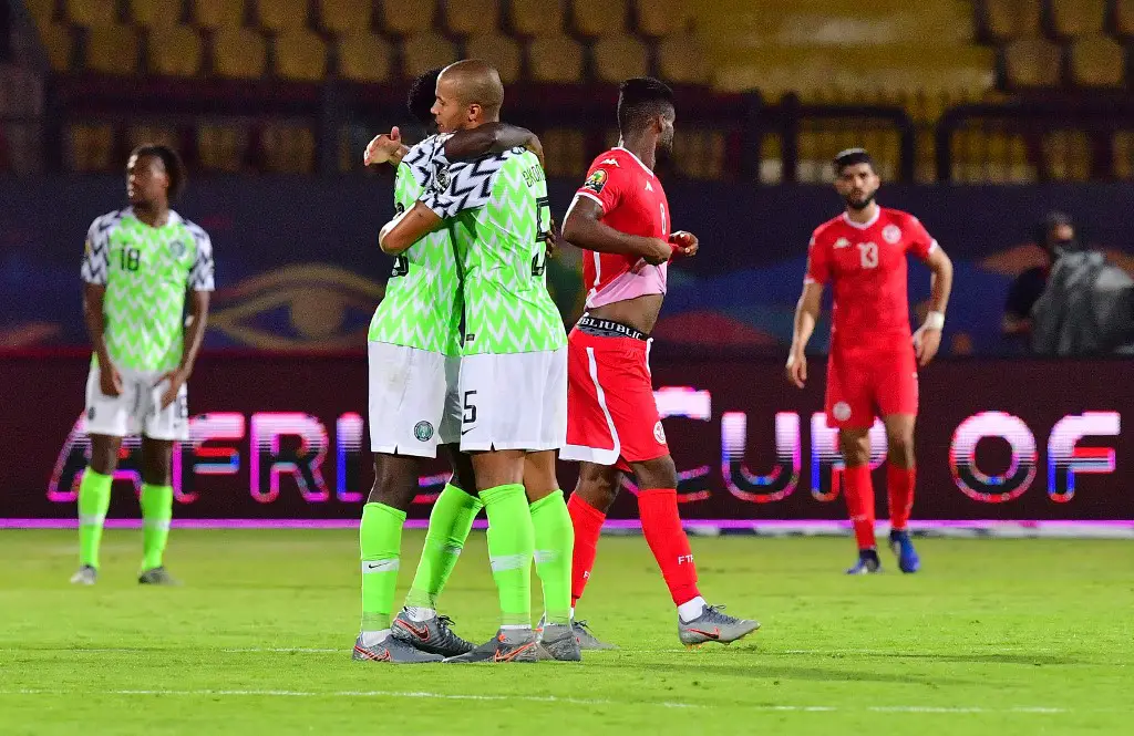 Nigeria players celebrate after winning the 2019 Africa Cup of Nations (CAN) third place play-off football match between Tunisia and Nigeria at the Al Salam stadium in Cairo on July 17, 2019. (Photo by Giuseppe CACACE / AFP)
