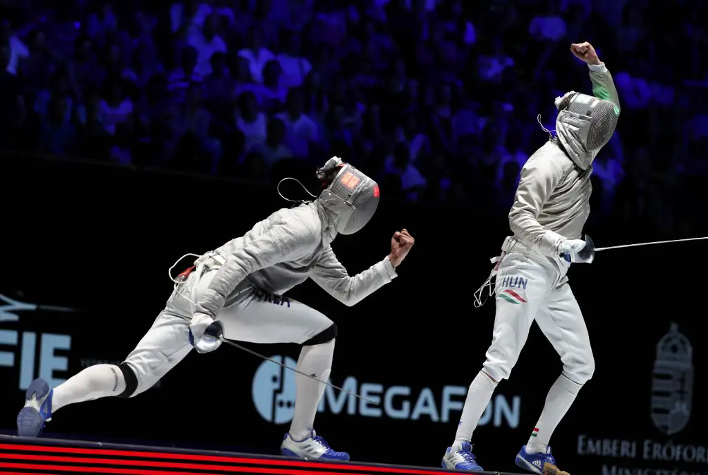 South Korea's Oh Sang-uk competes against Hungary's Andras Szatmar in the 2019 Fencing World Championships in Budapest, Hungary on July 18, 2019. (Photo by Peter Kohalmi / AFP)