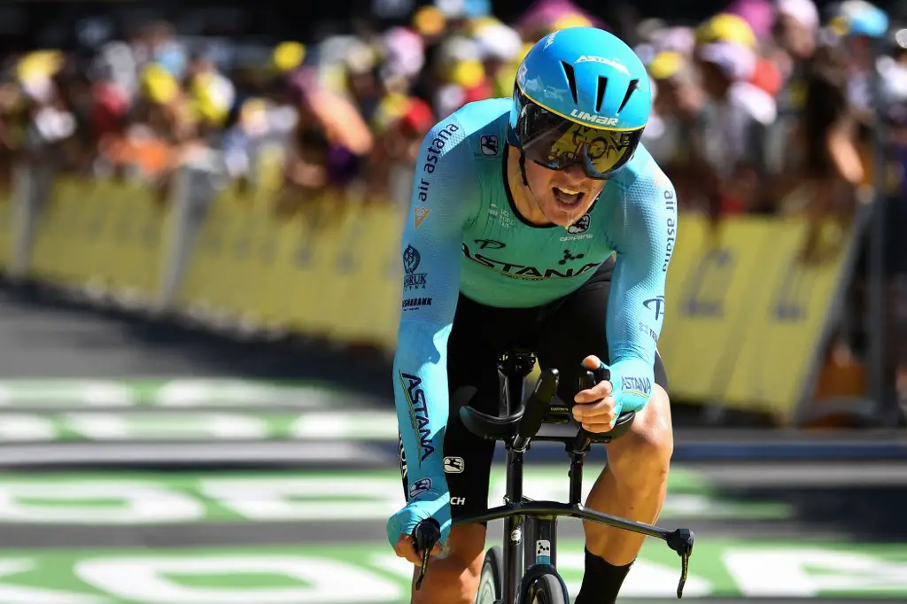 Denmark's Jakob Fuglsang crosses the finish line of the thirteenth stage of the 106th edition of the Tour de France cycling race, a 27,2-kilometer individual time-trial in Pau, on July 19, 2019. (Photo by JEFF PACHOUD / AFP)