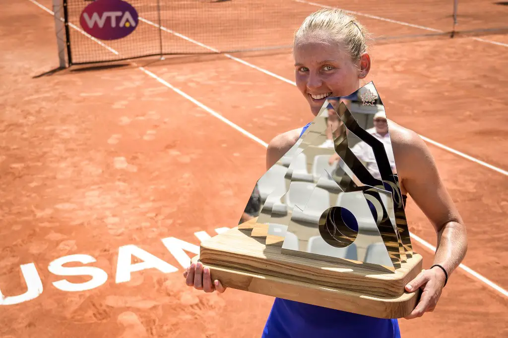 France's Fiona Ferro poses with her trophy after winning against compatriot Alize Cornet during their final match at the Ladies Open Lausanne WTA tennis tournament on July 21, 2019 in Lausanne. (Photo by FABRICE COFFRINI / AFP)