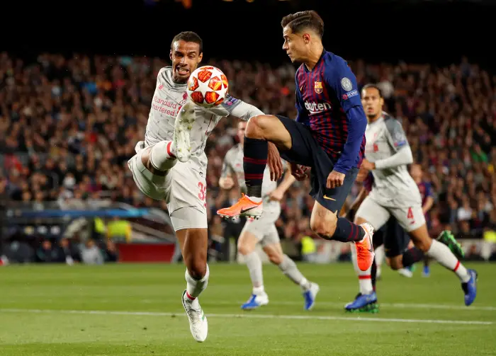 Soccer Football - Champions League Semi Final First Leg - FC Barcelona v Liverpool - Camp Nou, Barcelona, Spain - May 1, 2019  Liverpool's Joel Matip in action with Barcelona's Philippe Coutinho