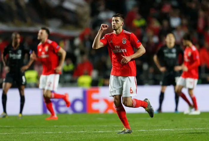 Benfica's Ruben Dias celebrates scoring their third goal