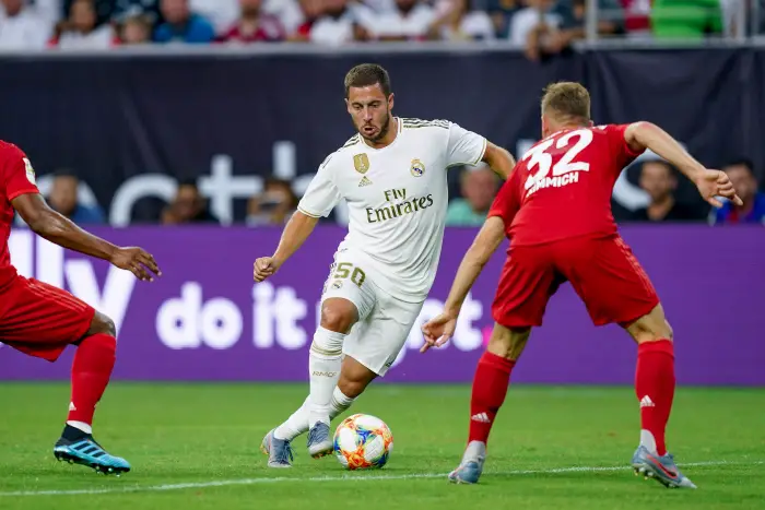 Real Madrid midfielder Eden Hazard (50) dribbles the ball