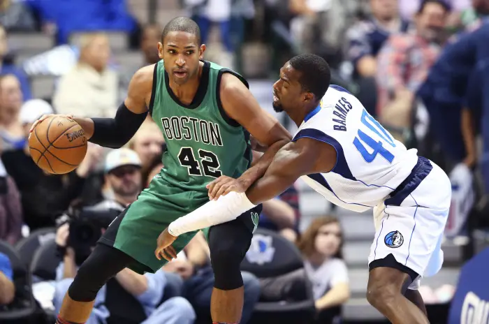 Boston Celtics center Al Horford (42) dribbles as Dallas Mavericks forward Harrison Barnes (40)