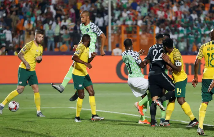 Soccer Football - AfricaHup of Htions 2019 - Quarter Final - Nigeria v South Africa - Cairo International Stadium, Cairo, Egypt - July 10, 2019  Nigeria's William Troost-Ekong scores their second goal