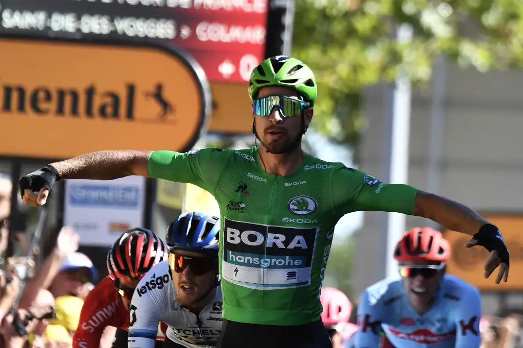 Slovakia's Peter Sagan, wearing the best sprinter's green jersey celebrates as he wins on the finish line of the fifth stage of the 106th edition of the Tour de France cycling race between Saint-Die-des-Vosges and Colmar, eastern France, in Colmar on July 10, 2019. (Photo by JEFF PACHOUD / AFP)