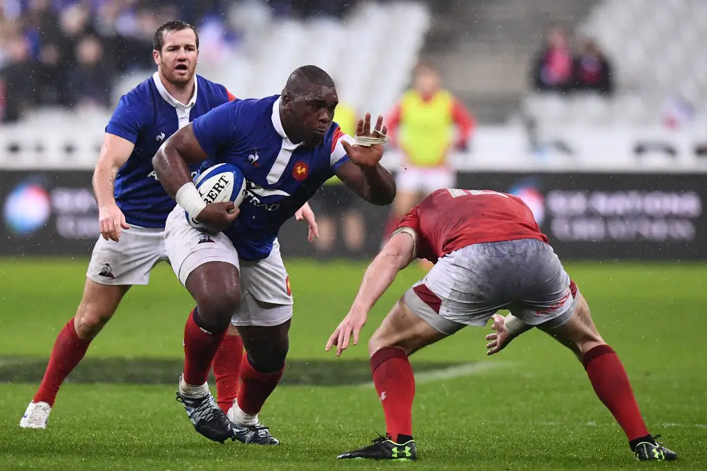 France's prop Demba Bamba (C) runs with the ball during the Six Nations rugby union tournament match between France and Wales at the stade de France, in Saint Denis, on the outskirts of Paris, on February 1, 2019. (Photo by FRANCK FIFE / AFP)