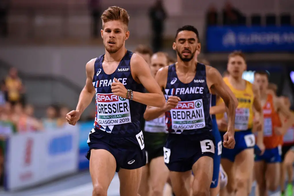 France's Jimmy Gressier (L) competes in the mens 3000m event at the 2019 European Athletics Indoor Championships in Glasgow on March 1, 2019. (Photo by Ben STANSALL / AFP)