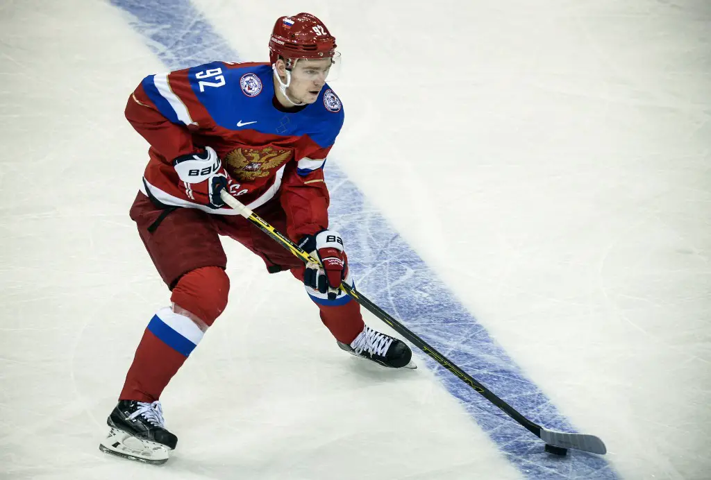 A picture taken on May 17, 2014 in Minsk, shows Russia's Washington Capitals' forward Yevgeni Kuznetsov in action during the game between Latvia and Russia at the 2014 IIHF Ice Hockey World. - The International Ice Hockey Federation (IIHF) announced on August 23, 2019 the suspension for four years of Russian hockey player Yevgeni Kuznetsov for violating anti-doping rules after a positive test for cocaine in May. The prohibited substance was found in a doping control which occurred on May 26, 2019 at the 2019 IIHF Ice Hockey World Championship, IIHF said. (Photo by Alexander NEMENOV / AFP)