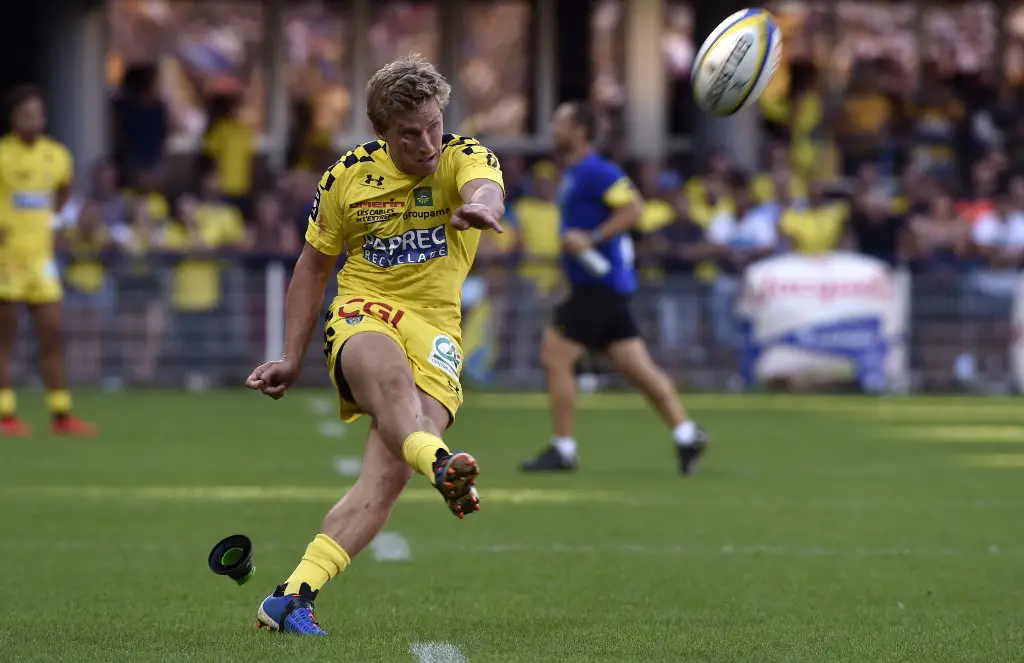 Clermont's Australian fly-half Jake Mcintyre hits a penalty kick during the French rugby union match between ASM Clermont and SR La Rochelle at the Michelin stadium in Clermont-Ferrand, central France, on August 25, 2019. (Photo by THIERRY ZOCCOLAN / AFP)