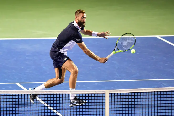 WINSTON SALEM, NORTH CAROLINA - AUGUST 23: Benoit Paire of France returns a shot from Steve Johnson during their semifinals match on day seven of the Winston-Salem Open at Wake Forest University on August 23, 2019 in Winston Salem, North Carolina. (Photo by Jared C. Tilton/Getty Images)