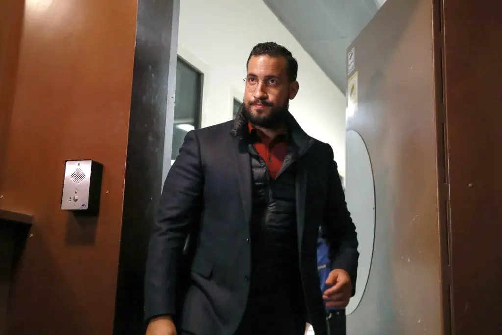 Former Elysee senior security officer Alexandre Benalla leaves after being released from provisional detention at the 'prison de la Sante' in Paris on February 26, 2019, following a week in jail for allegedly breaking the conditions of his bail. - Benalla faces criminal charges after it emerged in July 2018 that he roughed up protesters during a May Day demonstration in Paris while wearing a police helmet. The "Benalla affair" sparked a major scandal for the French President Emmanuel Macron, prompting a wave of accusations from opponents that the presidency covered it up. (Photo by JACQUES DEMARTHON / AFP)