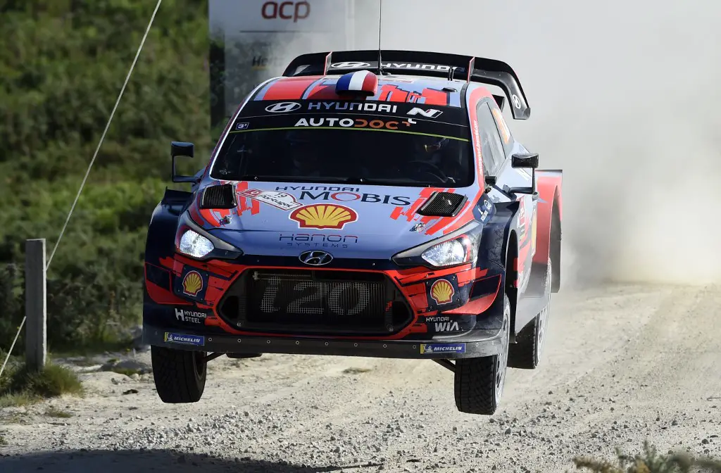 French driver Sebastien Loeb steers his Hyundai i20 Coupe WRC with Monegasque co-driver Daniel Elena during the SS8 stage of the Rally of Portugal near Vieira do Minho on June 1, 2019. (Photo by MIGUEL RIOPA / AFP)
