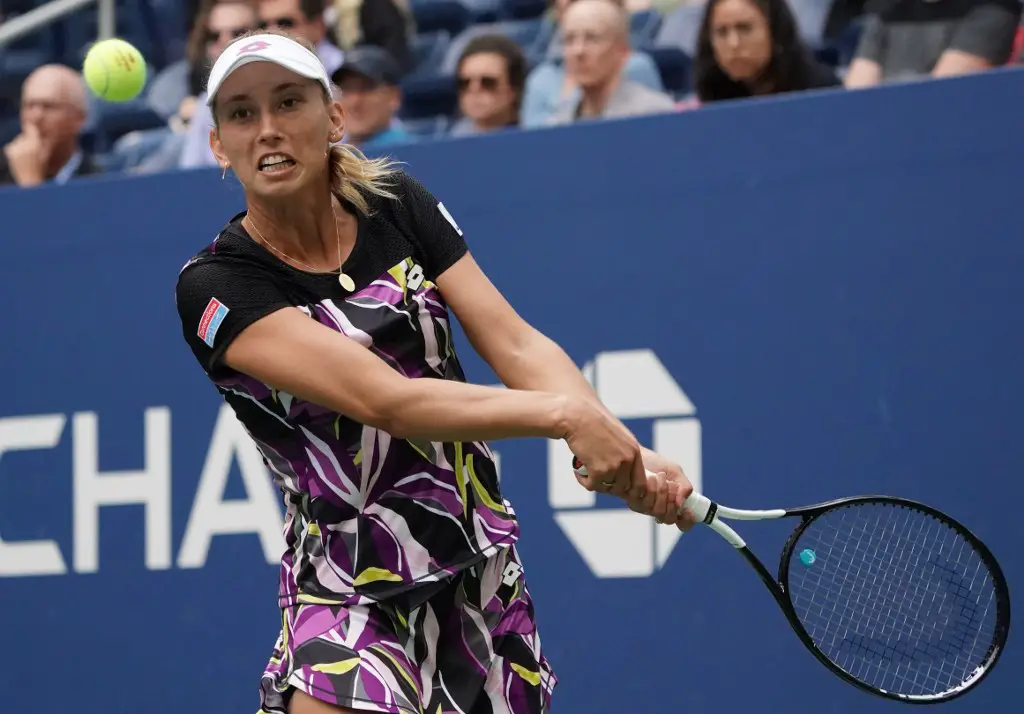 Elise Mertens of Belgium hits a return Kristie Ahn of the US during their Round Four Men's Singles at the 2019 US Open at the USTA Billie Jean King National Tennis Center in New York on September 2, 2019. (Photo by Kena Betancur / AFP)