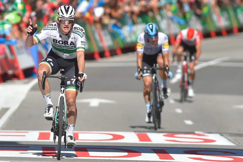 Team Bora rider Ireland's Sam Bennett crosses the finish line of the 14th stage of the 2019 La Vuelta cycling Tour of Spain, a 188 km race from San Vicente de la Barquera to Ovieda on September 7, 2019. (Photo by ANDER GILLENEA / AFP)