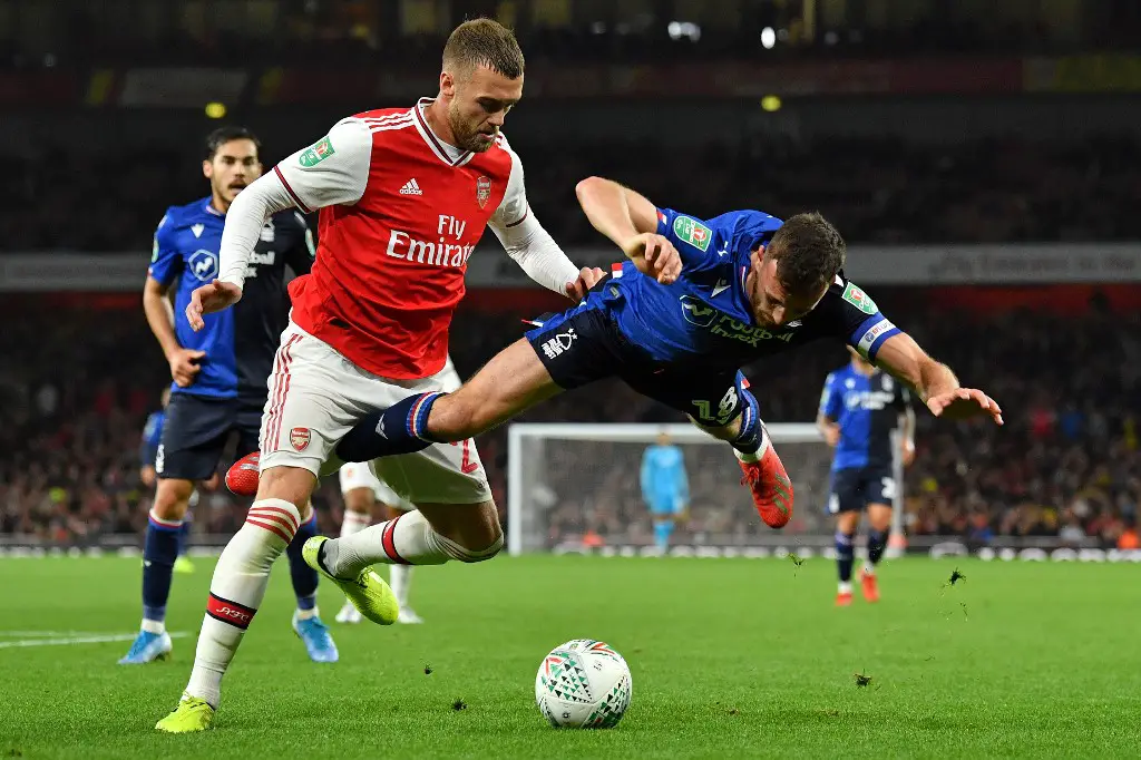 Nottingham Forest's English defender Jack Robinson (R) vies with Arsenal's English defender Calum Chambers during the English League Cup third round football match between Arsenal and Nottingham Forest at the Emirates Stadium in London on September 24, 2019. (Photo by Ben STANSALL / AFP) / RESTRICTED TO EDITORIAL USE. No use with unauthorized audio, video, data, fixture lists, club/league logos or 'live' services. Online in-match use limited to 120 images. An additional 40 images may be used in extra time. No video emulation. Social media in-match use limited to 120 images. An additional 40 images may be used in extra time. No use in betting publications, games or single club/league/player publications. /