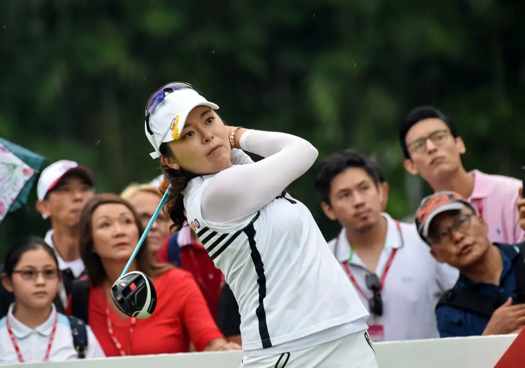Hur Mi Jung of South Korea tees off during the third round of the HSBC Women's Champions golf tournament at the Sentosa Golf Club in Singapore on March 4, 2017. (Photo by ROSLAN RAHMAN / AFP)