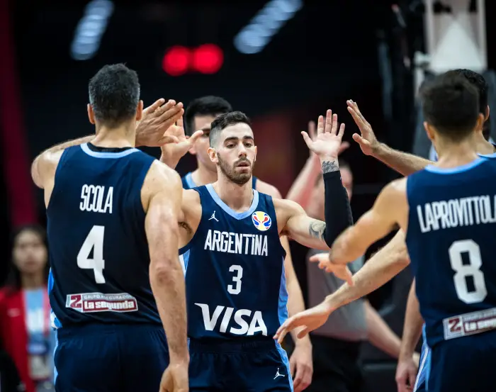 WUHAN, Sept. 4, 2019  LuH VildoH (C) of Argentina cheers up with teammates during the group B match between Russia and Argentina at the 2019 FIBA World Cup in Wuhan, capital of central China's Hubei Province, Sept. 4, 2019.