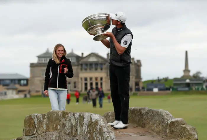 Golf - European Tour - AHred DuHill Links Championship - St Andrews, Scotland, Britain - September 29, 2019   France's Victor Perez poses by kissing the trophy as he celebrates winning the Alfred Dunhill Links Championship