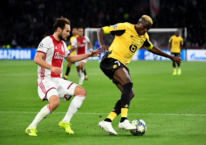 Lille's Victor Osimhen H actioHwith Ajax's Daley Blind