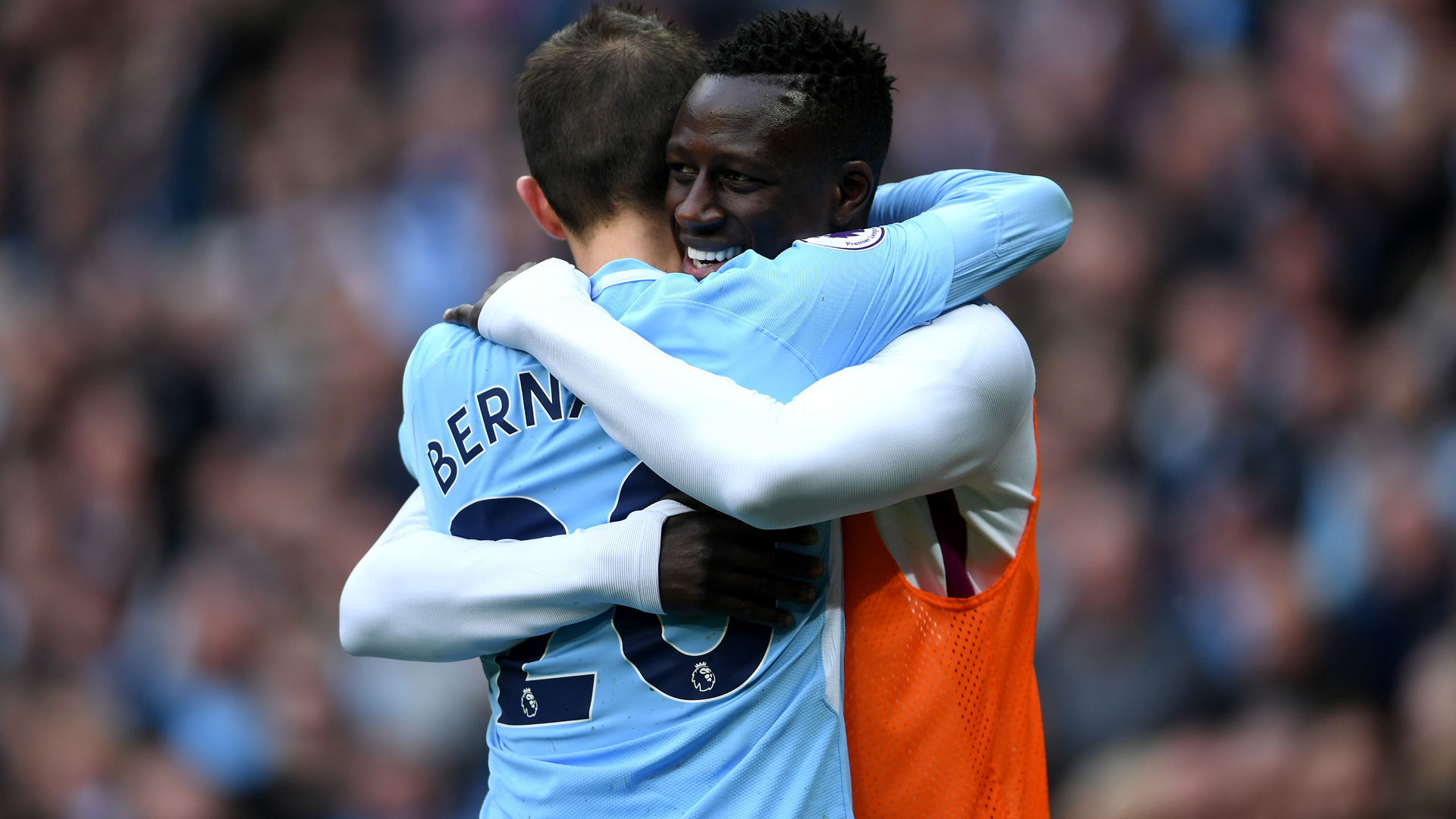 MANCHESTER, ENGLAND - APRIL 22:  Bernardo Silva of Manchester City celebrates scoring his side's fourth goal with Benjamin Mendy during the Premier League match between Manchester City and Swansea City at Etihad Stadium on April 22, 2018 in Manchester, England.  (Photo by Laurence Griffiths/Getty Images)