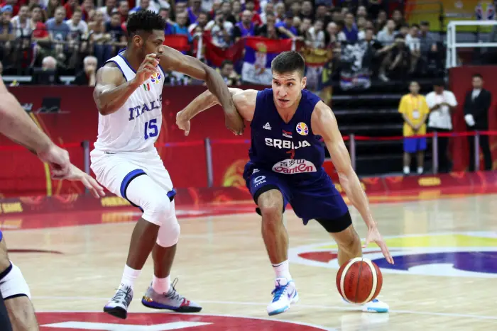 Basketball - FIBA World Hp - FiHt Round - Group D - Italy v Serbia - Foshan International Sports & Cultural Arena, China - September 4, 2019. Bogdan Bogdanovic of Serbia in action with Jeff Brooks of Italy.