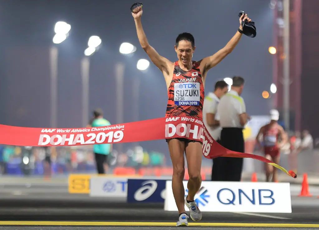 Japan's Yusuke Suzuki reacts as he wins the Men's 50km Race Walk final at the 2019 IAAF World Athletics Championships in Doha on September 29, 2019. (Photo by MUSTAFA ABUMUNES / AFP)