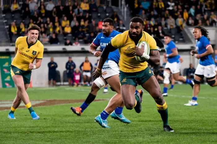 Marika Koroibete of thHWallabHs on his way to score a try during the international rugby test match