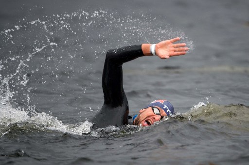 France's Axel Reymond competes in the men's 25km open water swimming at Loch Lomond, northwest of Glasgow, on August 12, 2018 during the 2018 European Championships. (Photo by François-Xavier MARIT / AFP)